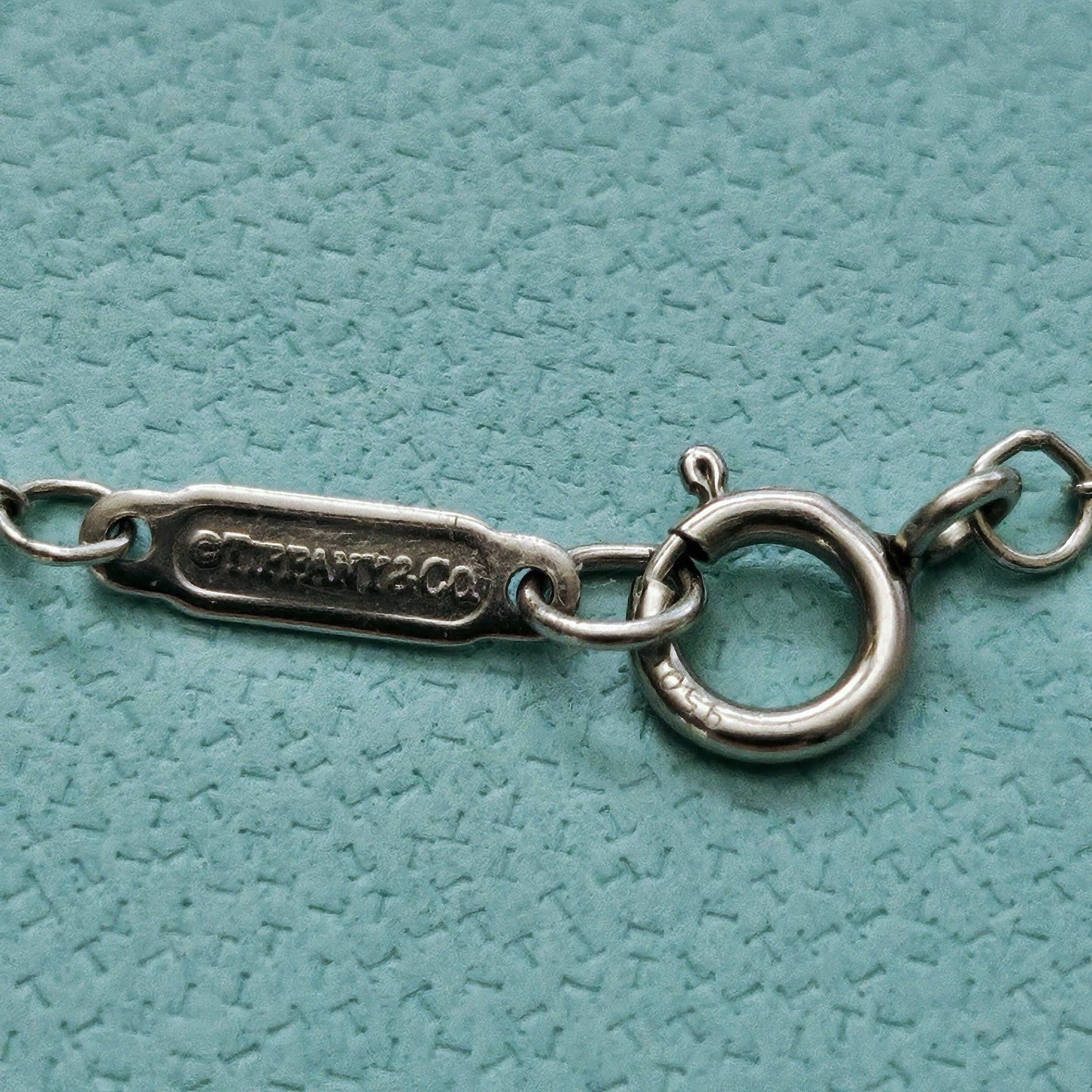 $4,510 Tiffany & Co. Round Brilliant Diamond Solitaire 0.36 ct Platinum Necklace