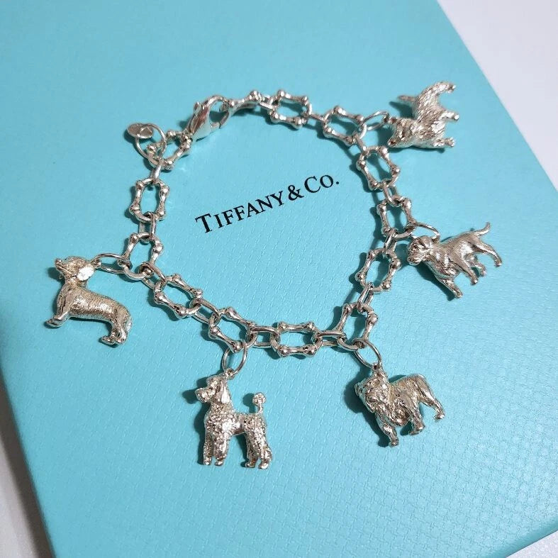 RARE Vintage Tiffany & Co. Multi Breed Dog Charm Bone Link Silver Bracelet