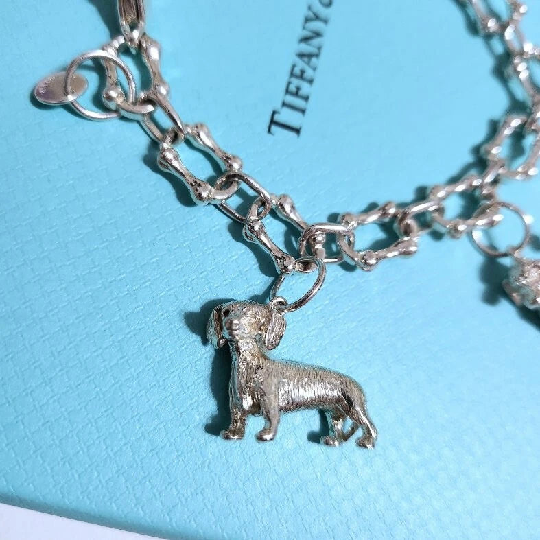 RARE Vintage Tiffany & Co. Multi Breed Dog Charm Bone Link Silver Bracelet