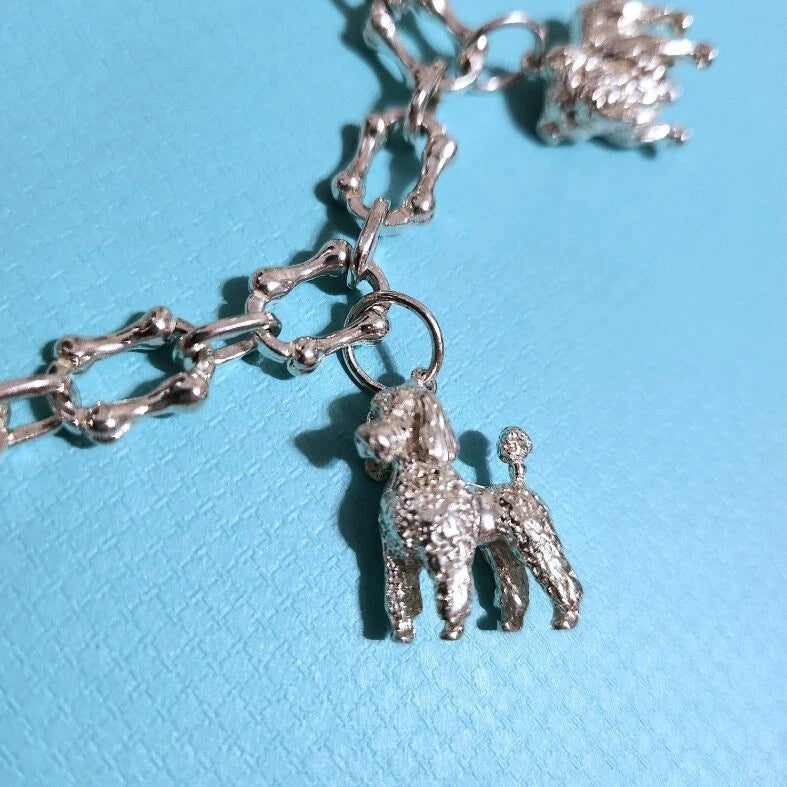 RARE Vintage Tiffany & Co. Multi Breed Dog Charm Bone Link Silver Bracelet
