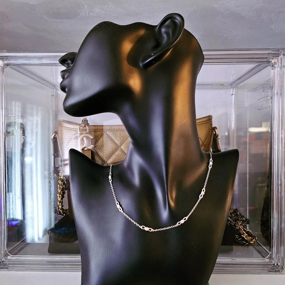 $6,000 Tiffany & Co. Bow Winged Station 0.7 CTW Diamond 18k White Gold Necklace