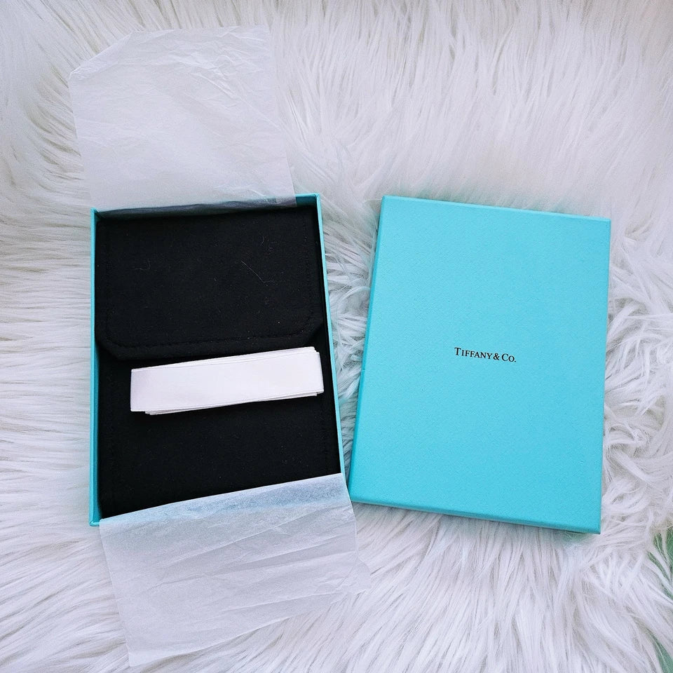 $6,000 Tiffany & Co. Bow Winged Station 0.7 CTW Diamond 18k White Gold Necklace