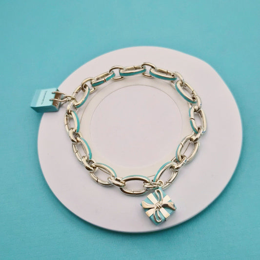 RARE Tiffany & Co Blue Enamel Clasping Oval Link Silver Bracelet w/ Charms
