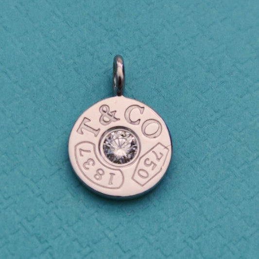 RARE Tiffany & Co. 1837 Circle Mini Pendant with 0.07 CT Diamond Center