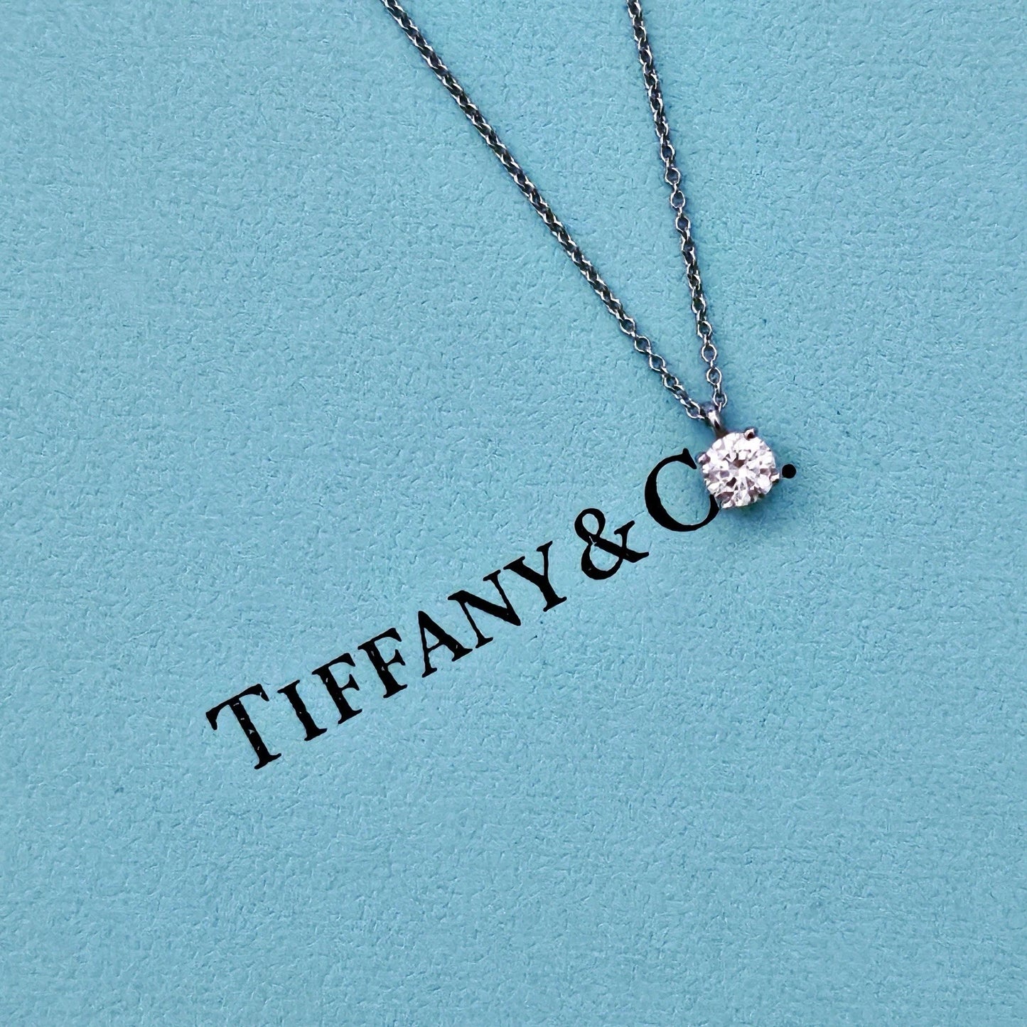 $4,510 Tiffany & Co. Round Brilliant Diamond Solitaire 0.36 ct Platinum Necklace