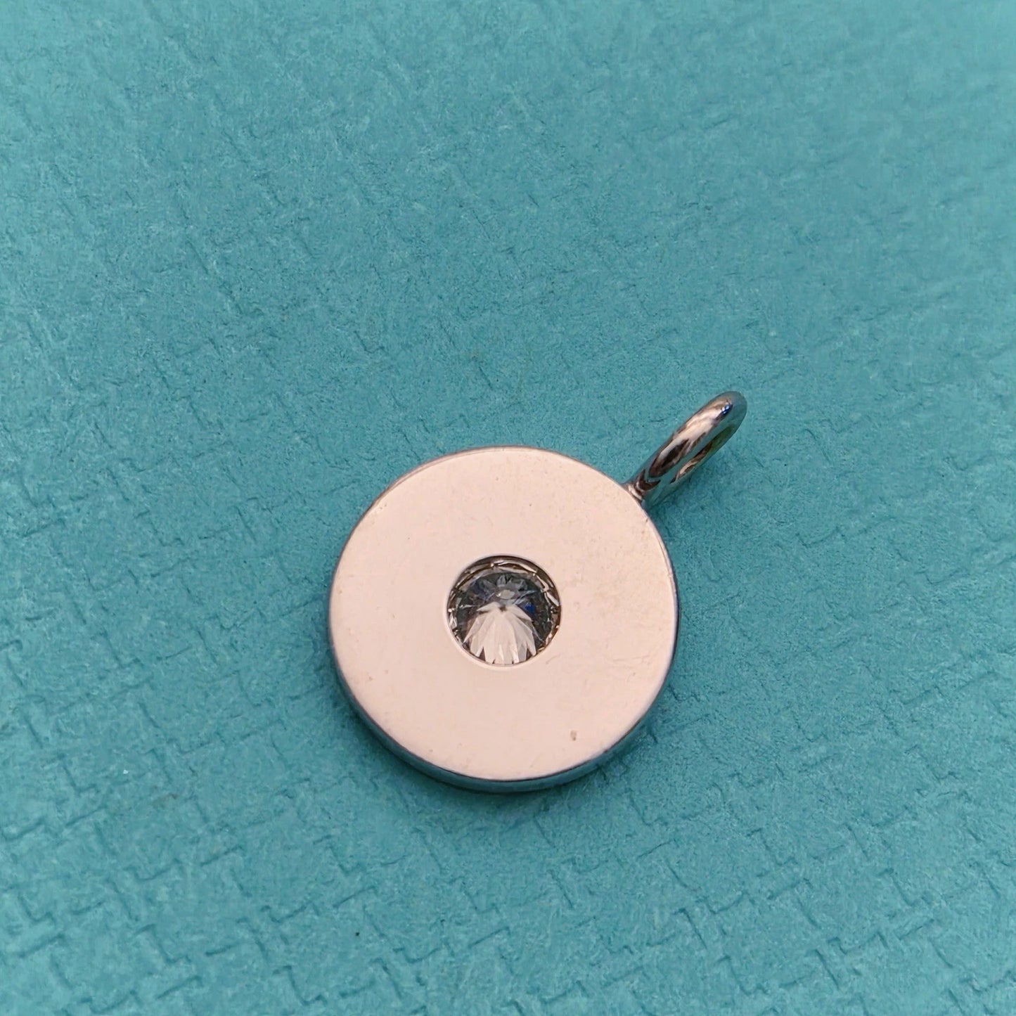 RARE Tiffany & Co. 1837 Circle Mini Pendant with 0.07 CT Diamond Center