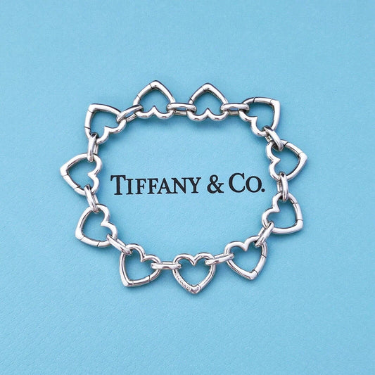 ULTRA RARE Vintage Tiffany & Co. Multi Heart Clasping Link Silver Bracelet