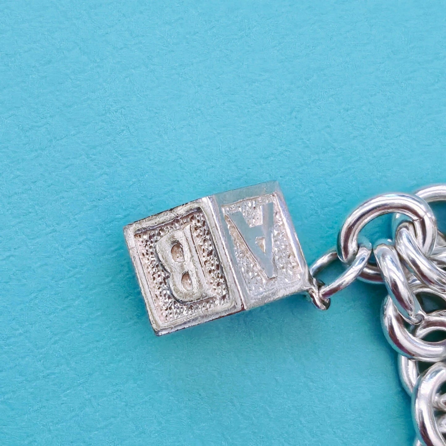 RARE Vintage Tiffany & Co. Baby Theme Dangle Charm Sterling Silver Bracelet