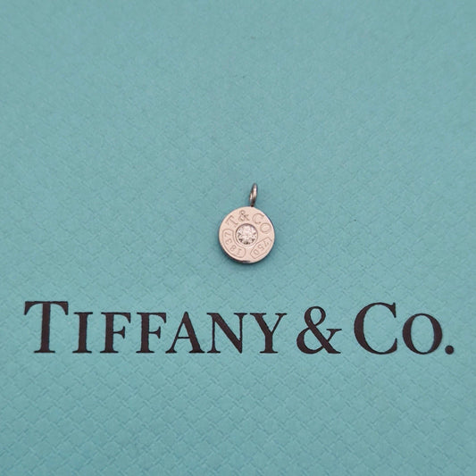 RARE Tiffany & Co. 1837 Circle Mini Pendant with 0.07 CT Diamond Center
